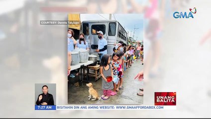 Asong matiyagang pumila para sa libreng lugaw, kinaaliwan ng netizens | UB