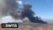 Raging wildfire in California destroys multiple structures as heatwave intensifies