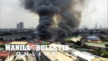 Aerial footage of a fire in a residential area in Quezon City