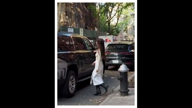 Emily Ratajkowski stuns in figure hugging dress and boots