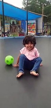 Little baby jumping on trampoline (jumping jhula)