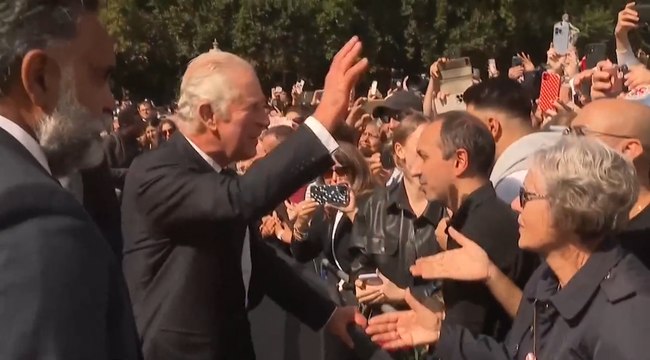 King Charles and Queen Consort greet crowds outside Buckingham Palace