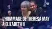 Theresa May se souvient du moment où elle a fait tomber du fromage devant Elizabeth II