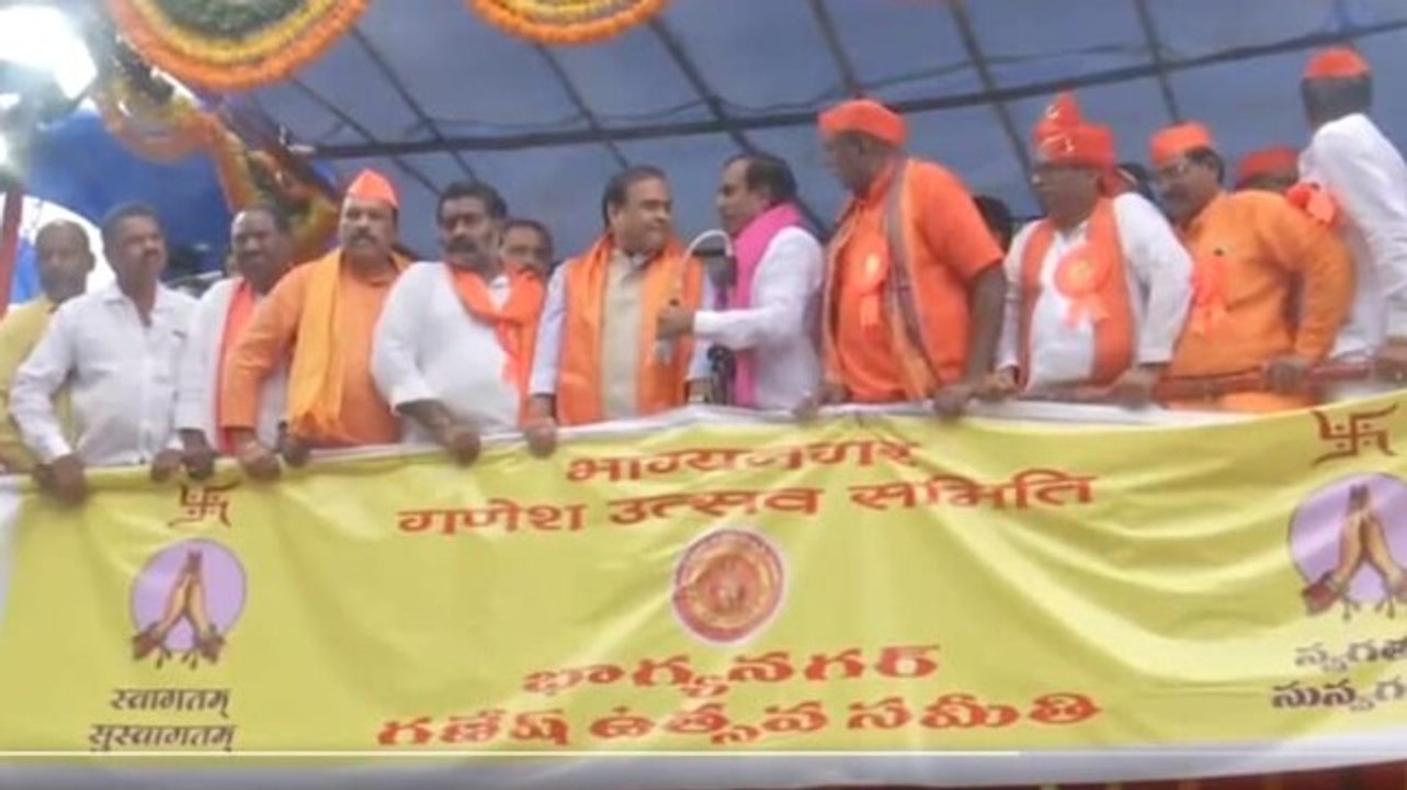 TRS worker snatches Assam CM Sarma's mic during Hyderabad event