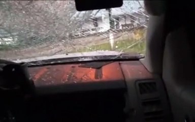Extremely Large Hail Breaks Windshield in Texas