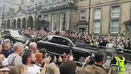 The Queen's cortage arrives on the Royal Mile in Edinburgh