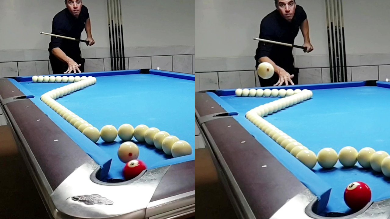 Man proficiently plays a difficult billiard trick shot