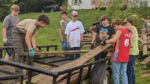 Youth Football Team Rebuilds Bridge Destroyed By Flooding