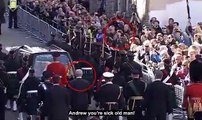 Prince Andrew is heckled as he follows Queen's coffin through Edinburgh by lone bystander who called him a 'sick old man' - before onlookers and police tackle him to the ground