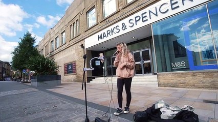 Burnley Town Centre busker entertains the public