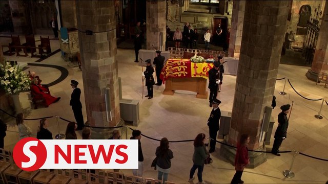 Mourners file past Queen's coffin before final journey from Scotland