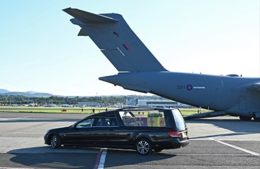 Queen Elizabeth’s coffin has arrived in London