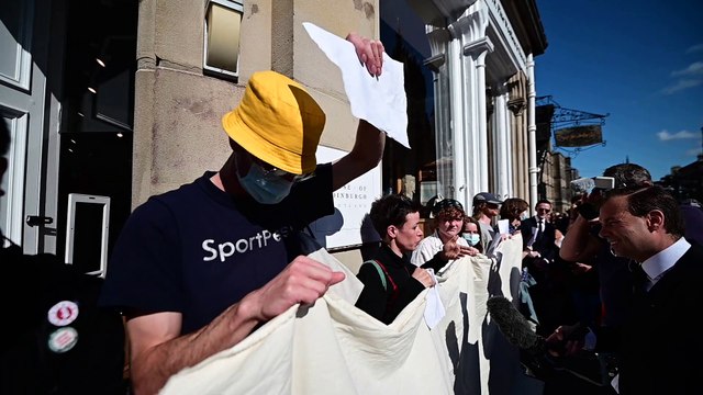 Freedom of speech protesters outside St Giles Cathedral where Queen Elizabeth II lies at rest