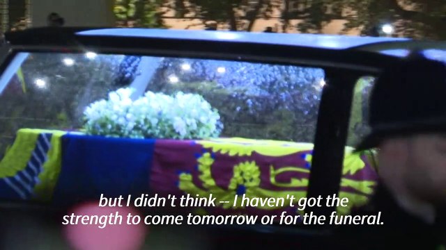 Crowds pay respects to Queen Elizabeth II as her coffin arrives at Buckingham Palace