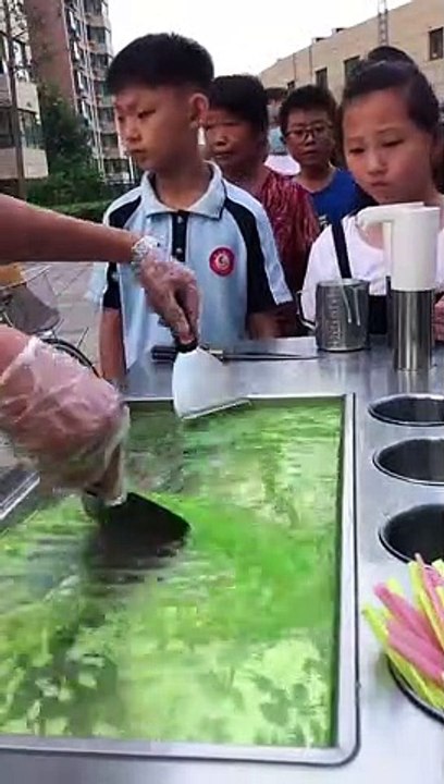 Making Ice-cream rolls with cool drink
