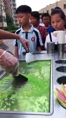 Making Ice-cream rolls with cool drink