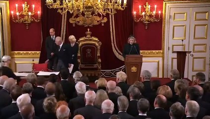 Moment King Charles III furiously motions for aide to move ink pot as he signs proclamation