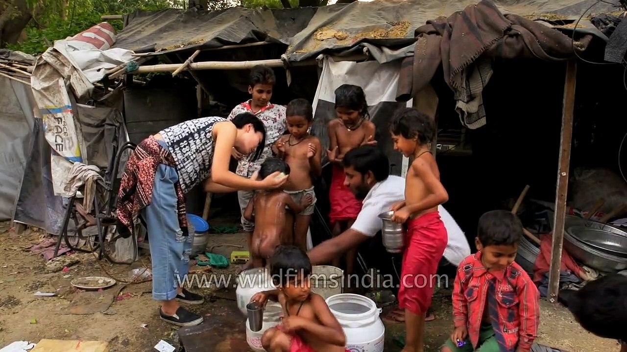 Wilderness Films India production person bathes her filming subjects!