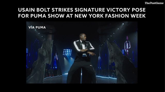 Usain Bolt Strikes Signature Victory Pose At New York Fashion Week