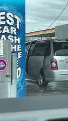 Man Uses Power Washer on Car Interior