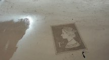 Sand artist releases 'goodbye' to late Queen featuring first class stamp with portrait on beach