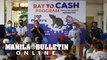 Marikina Mayor Marcy Teodoro speaks to hundreds of residents participating in the “Rat to Cash” program