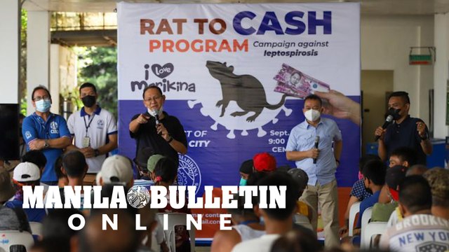 Marikina Mayor Marcy Teodoro speaks to hundreds of residents participating in the “Rat to Cash” program