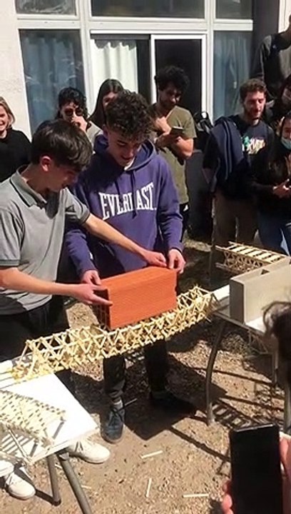 Interns Show Off Popsicle Stick Bridges