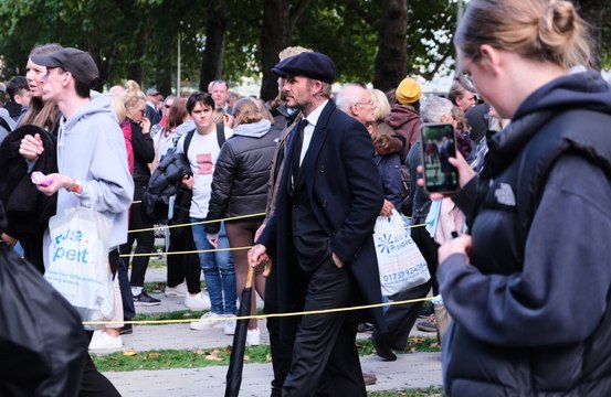 David Beckham joins thousands of mourners queueing for hours to pay respects to Queen Elizabeth lying in state
