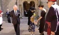 'Hi, I'm Keira!' Sweet moment a schoolgirl, 5, copies her mother and reaches out to shake the Queen Consort's hand after presenting her with a bunch of flowers - before running away in shyness