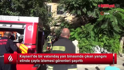 Film değil yangını izliyor! Görenleri şoke eden an