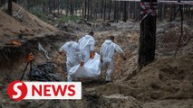 Ukraine finds hundreds in mass grave in Izium