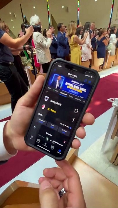 Groom Given Game Update During Wedding