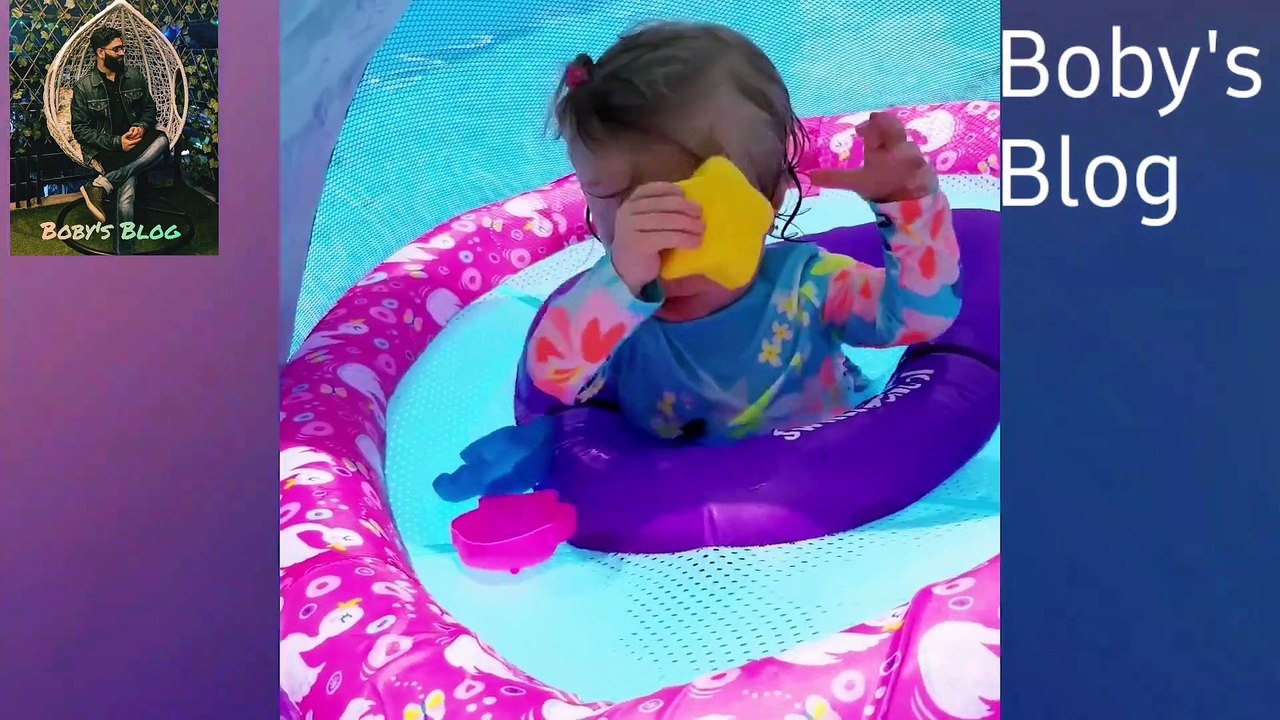 Kids on summing funny pool video.