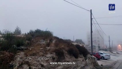 تشكل الضباب في منطقة مرج الحمام بالعاصمة عمان صباح الاثنين