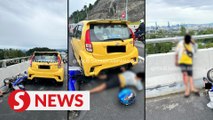 Motorcyclist rams into car after driver stops on SUKE emergency lane to take pictures