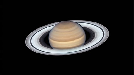 Saturn left with a tilt after its own moon crashed into it