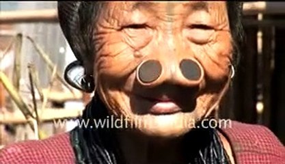 Apatani women cooking pig