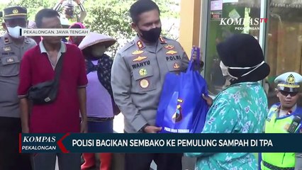Polisi Bagikan Sembako ke Pemulung Sampah di TPA