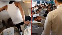 Uçakta panik anları! Yolcularına sinirlenen şahıs camlara tekme attı, koltukları yumrukladı