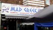 The Mad Greek takeaway is unhappy about new shutters installed by a neighbouring pizza restaurant