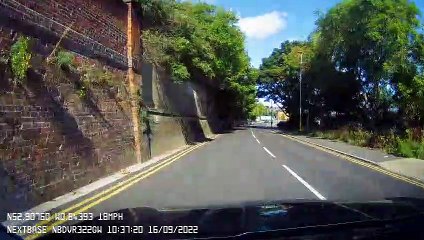 Driver's dashcam footage captures near-miss with cyclist at busy Grantham junction