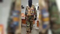 Hombre armado toma 12 rehenes en un banco de Georgia