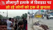 4 dead as truck runs over people sleeping on road divider