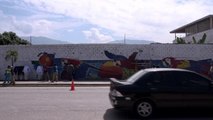 Venezuelalı geri dönüşüm sanatçısı şişe kapaklarıyla duvar resimleri yapıyor