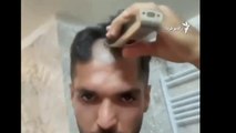 İran'da kadınların ardından erkekler de saçlarını kesmeye başladı