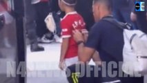 Cristiano Ronaldo's Heart Touching Moment With Young Fan When He Hugs The Fan and Signs on Fan Shirt