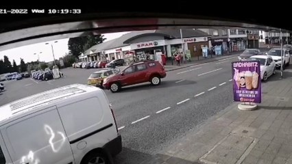 Police car smashes through entrance of Spar supermarket in middle of emergency