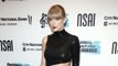 Taylor Swift Was Honored as Songwriter of the Decade in a Black Sequin Cutout Gown With a Sky-High Slit
