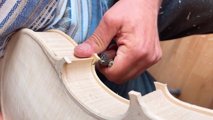 Hand-carving violins and cellos
